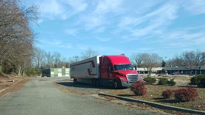 Crete Carriers Parked at Shopping Center
