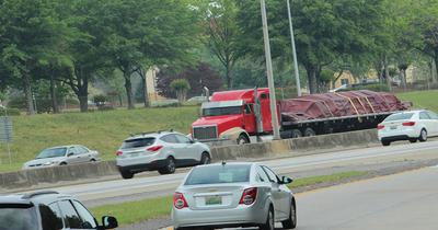 Hauling tarped flatbed load on the highway