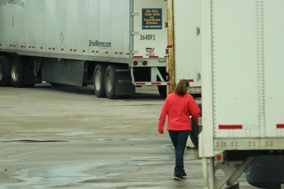 Passenger going trucking with driver