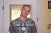 he has several Tatts Elijah is on his right Forearm